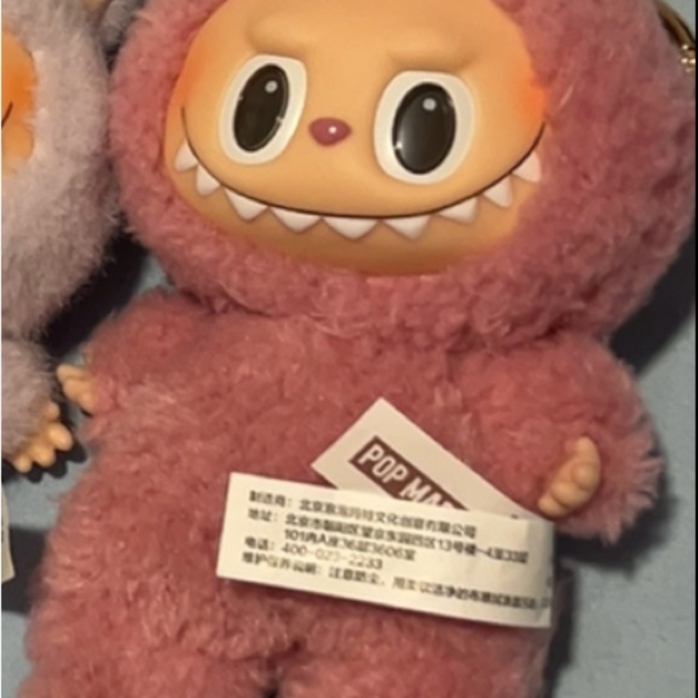 Pink Furry Monster Plush Toy